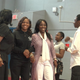 A’Ja Booth and Nadirah Muhammad walk arm in arm at the school’s celebration.
Detroit Public Schools